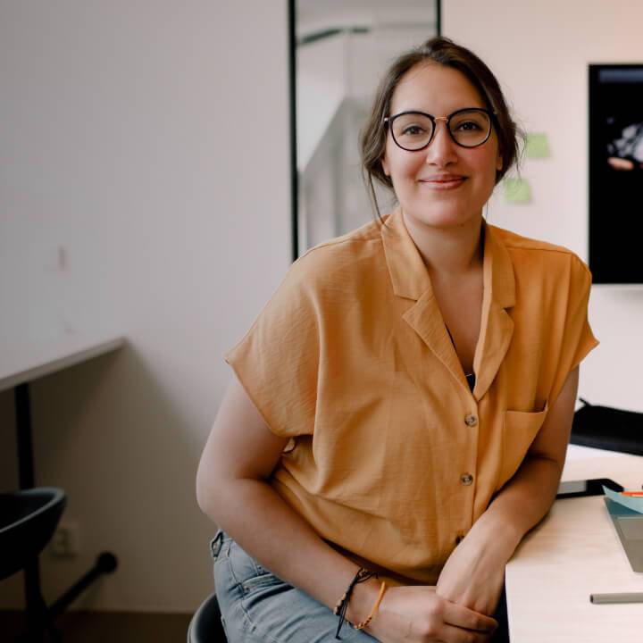 Woman by desk